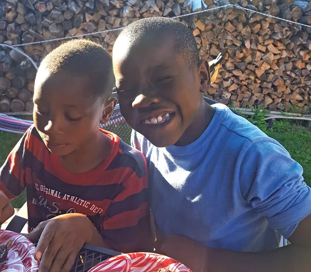 Ali Muhina (right) and his friend Mohammed Osman - HILLARY GOMBAR