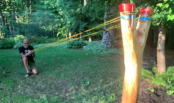 Stuck in Vermont: Troy Headrick Sculpts a Giant Slingshot for His Burlington Backyard