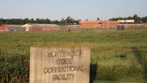 Nearly 50 Inmates and Staffers at Northwest Prison Have COVID-19