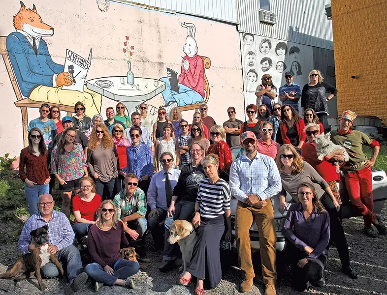 BOTTOM ROW: Moxie, Matthew Roy, Corey Grenier, Copper, Obi, Michelle Brown, Colby Roberts, Alex Mauss - SECOND ROW: Andrea Suozzo, Dan Bolles, Michael Bradshaw, Cathy Resmer, Ashley Cleare, Don Eggert, Terri Hallenbeck, Diane Sullivan, Rufus, Matthew Thorsen - THIRD ROW: Carolyn Fox, Rachel Elizabeth Jones, Cheryl Brownell, Molly Walsh, Kristen Ravin, Alicia Freese, Sasha Goldstein, Kristen Hutter, Pamela Polston, Paula Routly - FOURTH ROW: Bryan Parmelee, James Buck, Kymelya Sari, Mark Davis, Madie Ahrens, Richele Young, Katie Jickling, Kirsten Cheney, Elizabeth M. Seyler - BACK ROW: Eva Sollberger, Sadie Williams, Jordan Adams, Logan Pintka, Kaitlin Montgomery, Sally Pollak, Rick Woods, Ken Picard, John James, Matt Weiner, Robyn Birgisson - WALL: Brett Stanciu, Brooke Bousquet, Meredith Coeyman, Hannah Palmer Egan, Paul Heintz, Jeff Baron, Candace Page, Margot Harrison, Alison Novak - MISSING: Circulation technicians Harry Applegate, Joe Bouffard, Pat Bouffard, Caleb Bronz, Colin Clary, Donna Delmoora, Todd Field, Matt Hagen, Bryan McNamara, Nat Michael, Bill Mullins, Dan Nesbitt, Ezra Oklan, Brandon Robertson, Dan Thayer, Josh Weinstein - MURAL BY: Kolter Hodgson - LOCATION: In the parking lot between Kerry's Kwik Stop and ReSource. - MATTHEW THORSEN