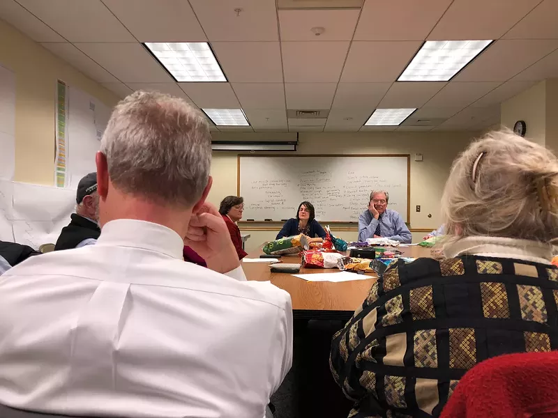 Senate Democrats meeting in the basement of a state office building. - ALICIA FREESE