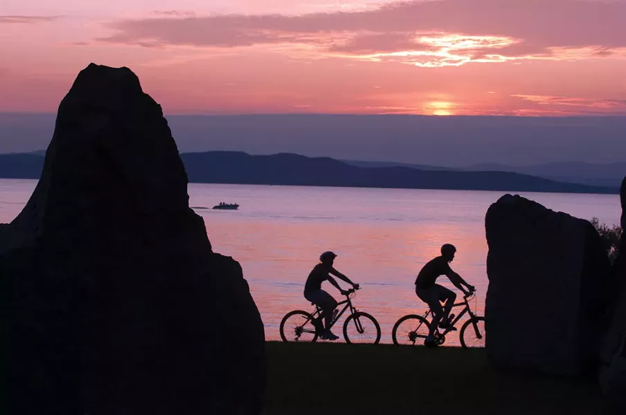 Evening ride along the Burlington bike path. - FILE: CALEB KENNA