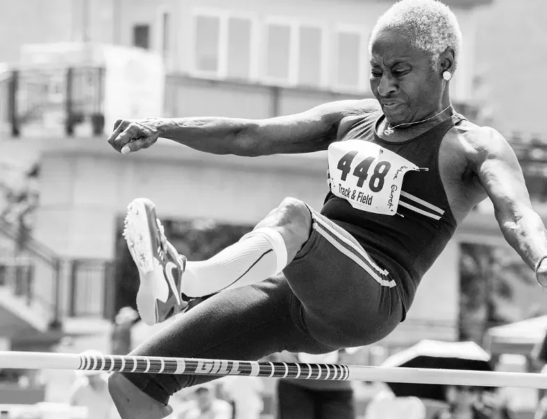 Elliot Burg, "Barbara Garrett, 74, high jump"