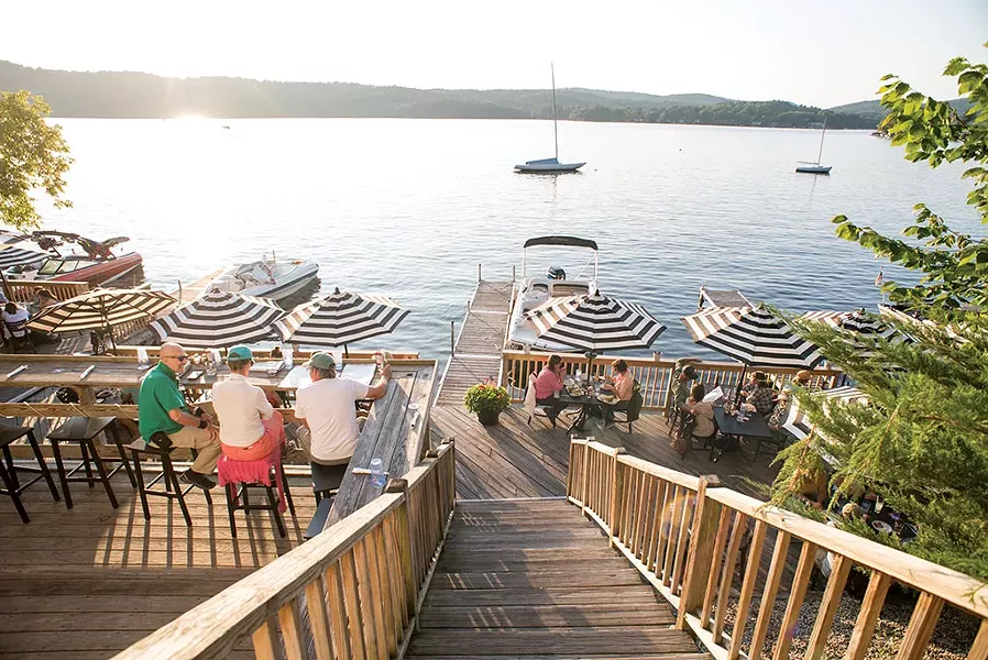 Outdoor dining at Lake House Pub & Grill - CALEB KENNA