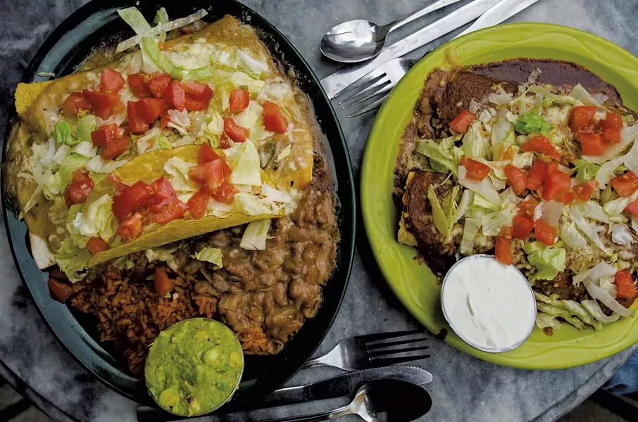 The Estrella, a plate offering a burrito, an enchilada and a hard taco (left) and an order of enchiladas at El Toro - GLENN RUSSELL