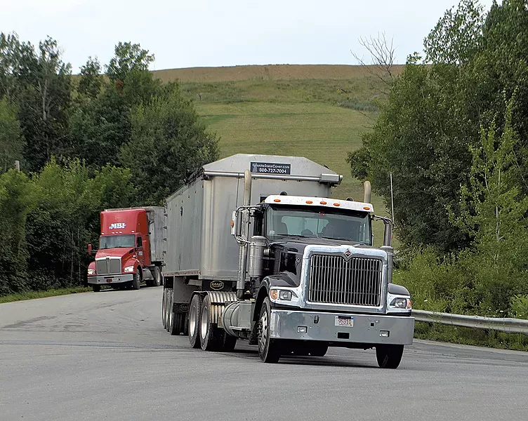 Trucks leaving Coventry landfill - MOLLY WALSH
