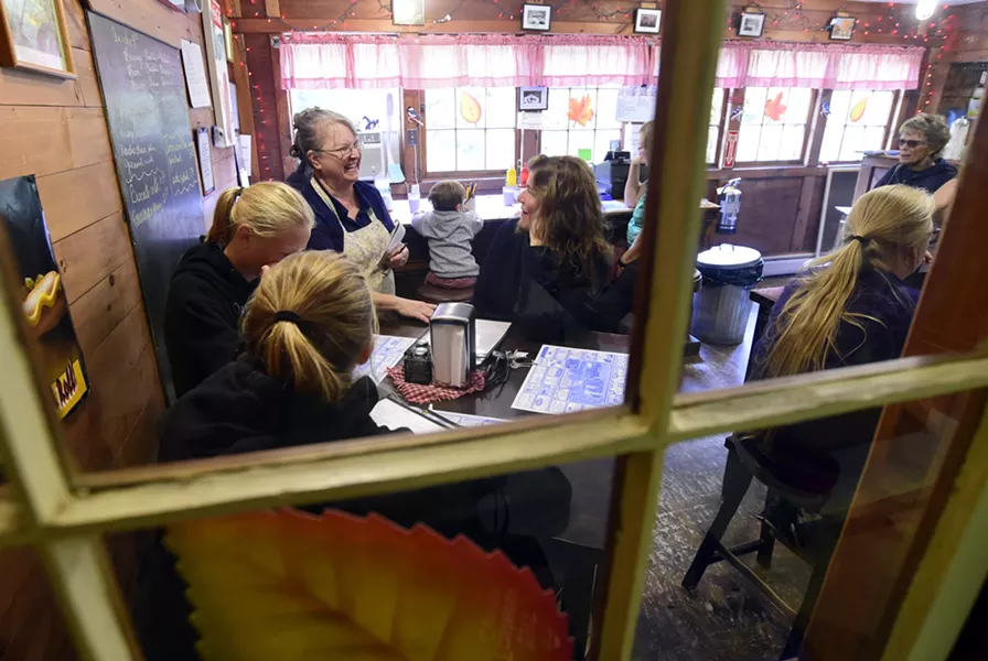 Sarah Mangan with customers at Sarah's Country Diner, Cabot - JEB WALLACE-BRODEUR