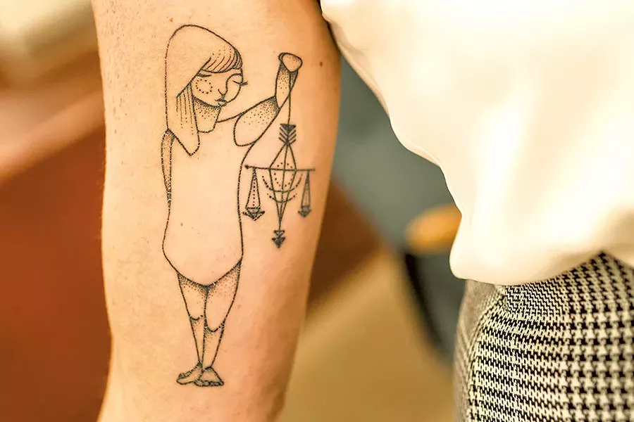 George's new tattoo - OLIVER PARINI