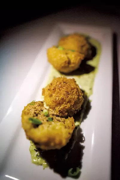 Arancini with saffron risotto, sweet corn, house herbs, sausage and cheddar at Cork Wine Bar & Market - GLENN RUSSELL