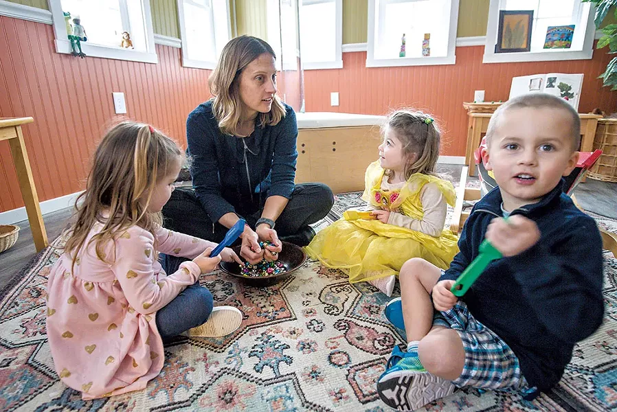 Kate Driver playing with 3-year-olds Lacey, Sadie and Tucker at Georgia's Next Generation - GLENN RUSSELL