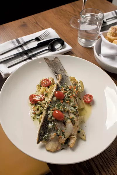 Branzino with grilled artichoke caponata - CALEB KENNA