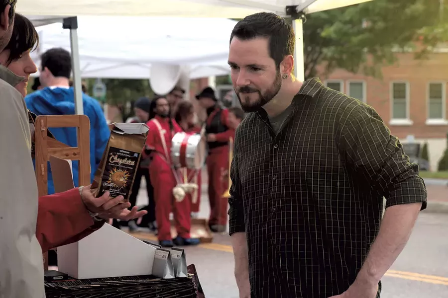 Justin Bigelow at the Winooski Farmers Market - MATTHEW THORSEN