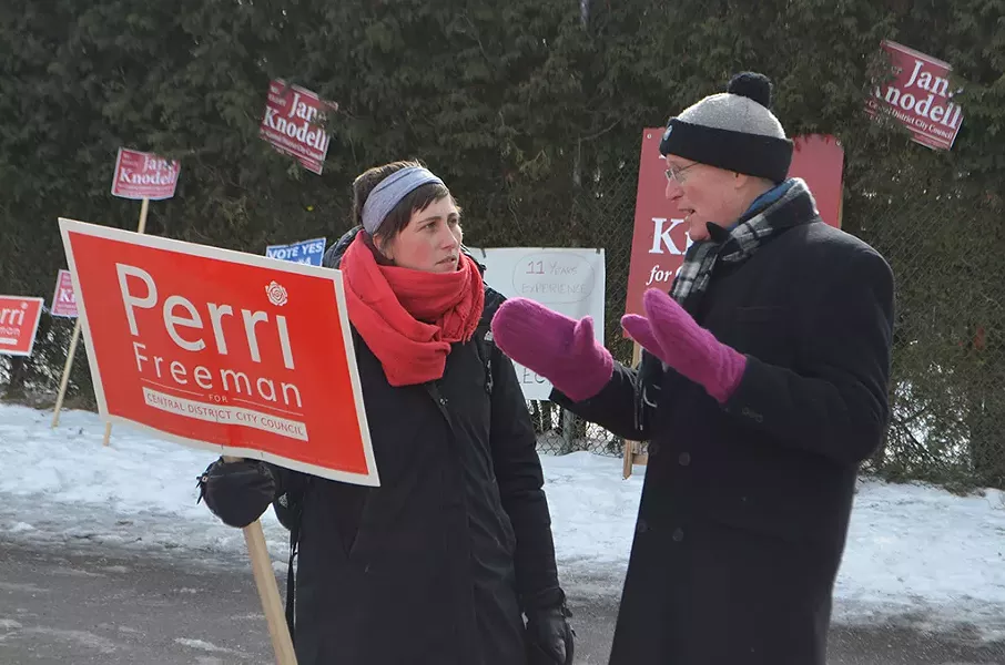 Curt McCormack discusses transportation policy with Perri Freeman outside the Sustainability Academy - KEVIN MCCALLUM