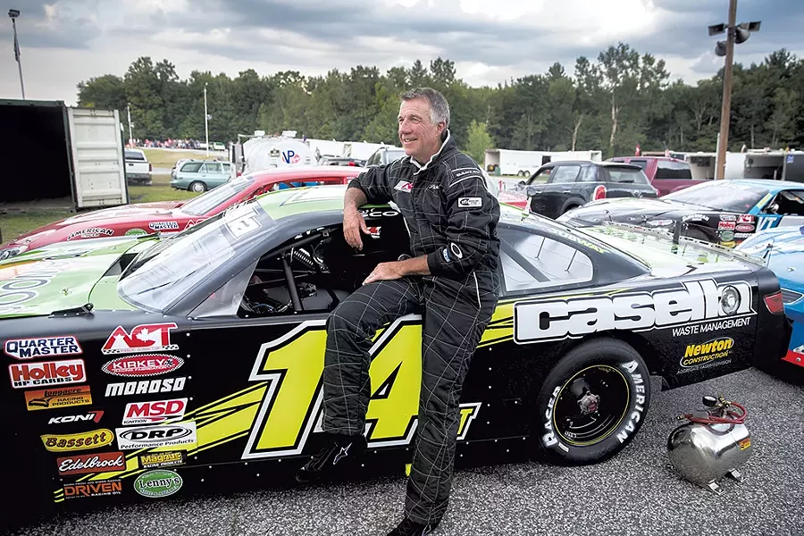 Then-lieutenant governor Phil Scott in August 2016, when Casella sponsored his racecar - FILE: JAMES BUCK