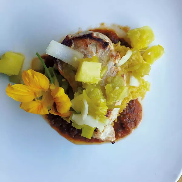 Pork chops with roasted pineapple and chipotle red pepper purée - COURTESY OF CHIP NATVIG