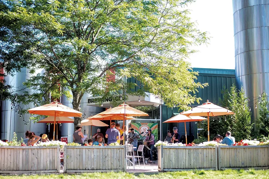 Seasonal patio at Otter Creek Brewing - COURTESY OF OTTER CREEK BREWING