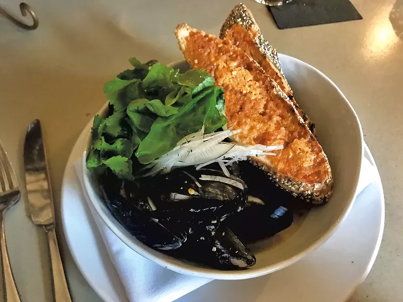 Mussels and grilled bread with kimchi butter at Kismet - CHELSEA EDGAR