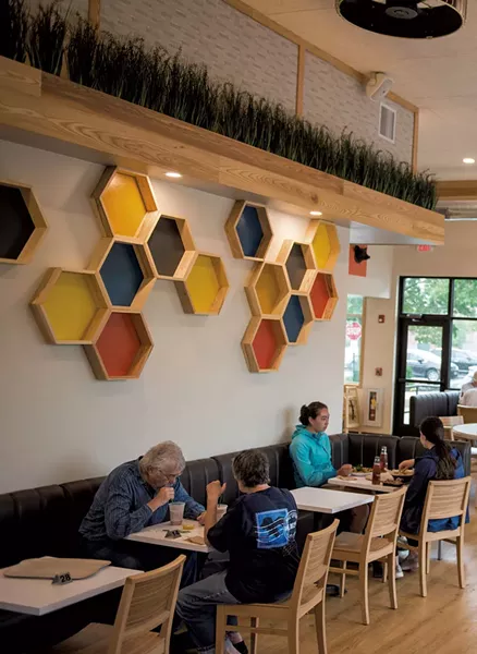 Patrons eating at Bliss Bee - DARIA BISHOP