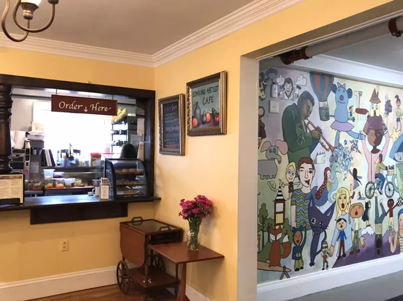 Service counter at Starving Artist Café - JORDAN BARRY
