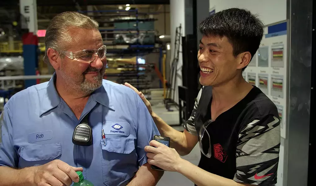 SIDE BY SIDE Chinese and American heartland - workers work through their differences in - Bognar and Reichert’s must-see documentary