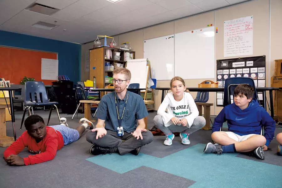 Michael Kellogg storytelling in his Williston Central School 3rd and 4th grade class - OLIVER PARINI