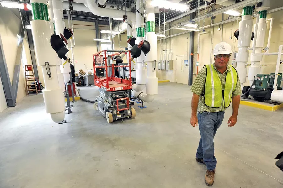 Mike Stevens in the new heating and cooling plant of the new Waterbury complex - JEB WALLACE-BRODEUR