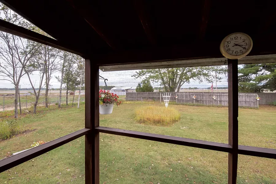 Ed and Gail Garvey can watch planes taxi from their back porch - LUKE AWTRY