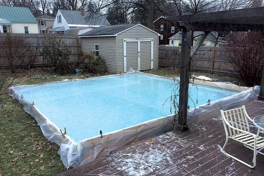 Backyard skating rink - ERIK ESCKILSEN