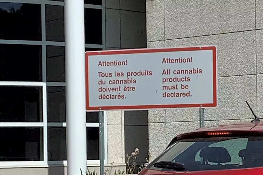 Sign at the Canadian border - JOHN JAMES