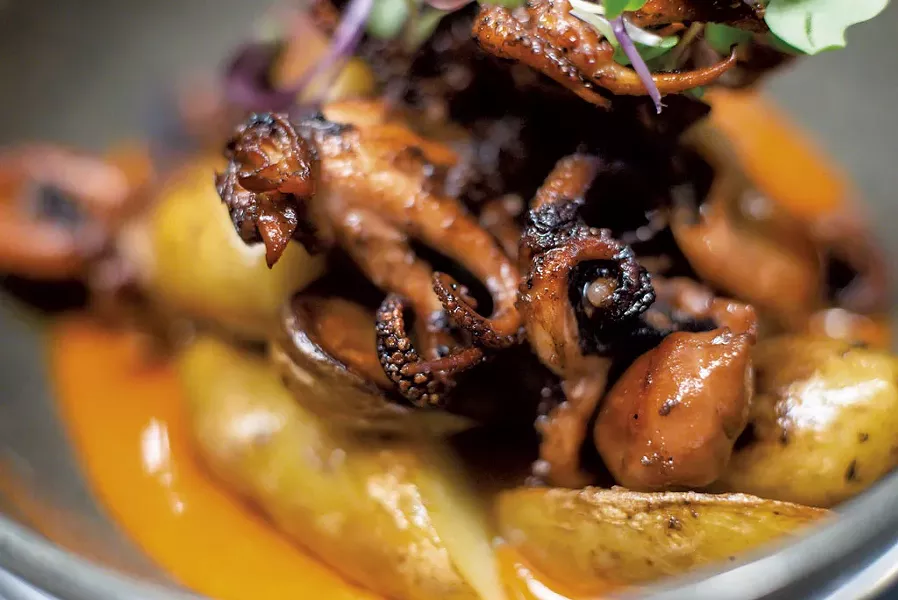 Seared octopus with fingerling potatoes, harissa and chile oil at Poco - FILE: GLENN RUSSELL