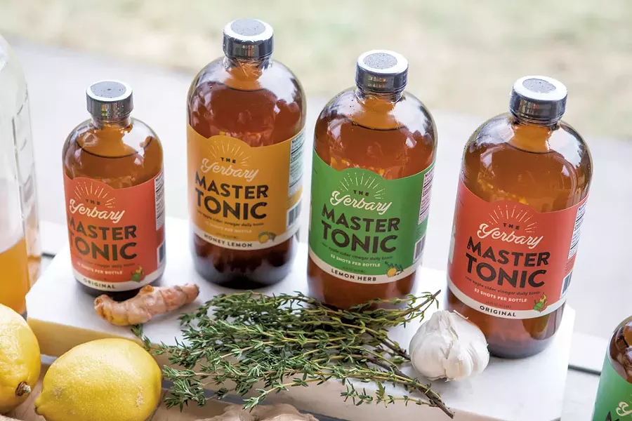 Fresh ingredients and finished Yerbary Master Tonic products - LUKE AWTRY