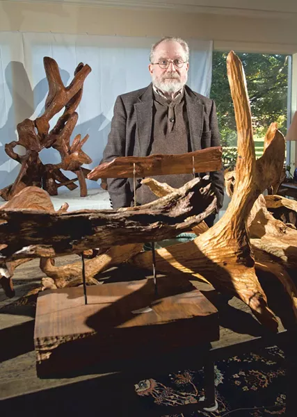 Rabbi Joshua Chason at home with his sculptures - MATTHEW THORSEN