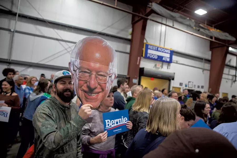 Jack Crookes holding a cutout of Sanders - JAMES BUCK