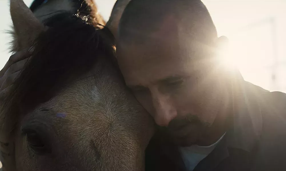 WILD HORSES: Schoenaerts plays a convict who fi nds hope in an unlikely place in Clermont-Tonnerre’s directorial debut. - FOCUS FEATURES