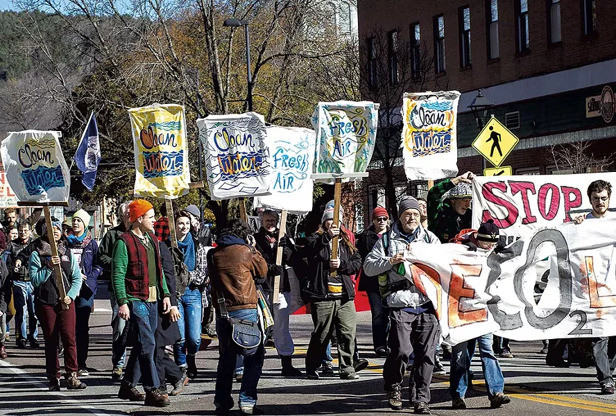 A Rising Tide protest in downtown Montpelier - JENNIFER LANGILLE