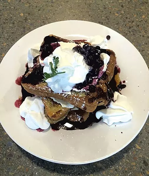 Carriage House Café & Grill's blueberry-stuffed waffles - COURTESY OF CARRIAGE HOUSE CAFÉ & GRILL