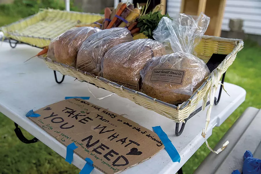Food Not Bombs table - JAMES BUCK