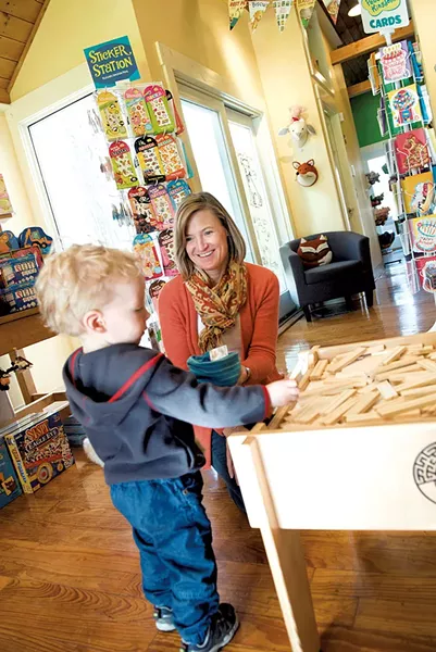 Becky Dayton with a young customer - CALEB KENNA