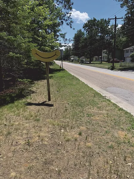 Grin sign - KEN PICARD