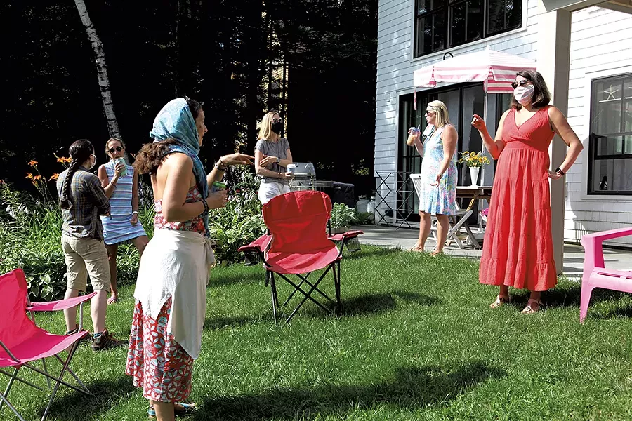 Christina Deeley (right) chatting with supporter Michelle McGee - KEVIN MCCALLUM ©️ SEVEN DAYS