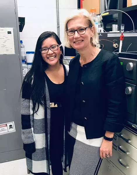 Cao in the lab with principal investigator Dr. Sylvie Doublié - COURTESY OF VY CAO