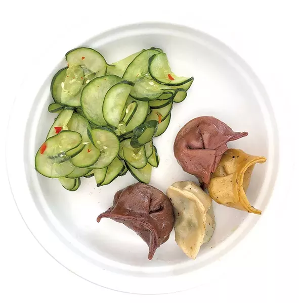 Four-piece meat-free potsticker variety plate with a side of marinated cucumber from Green Mountain Potstickers at the Burlington Farmers Market - FILE: DAVID HOLUB