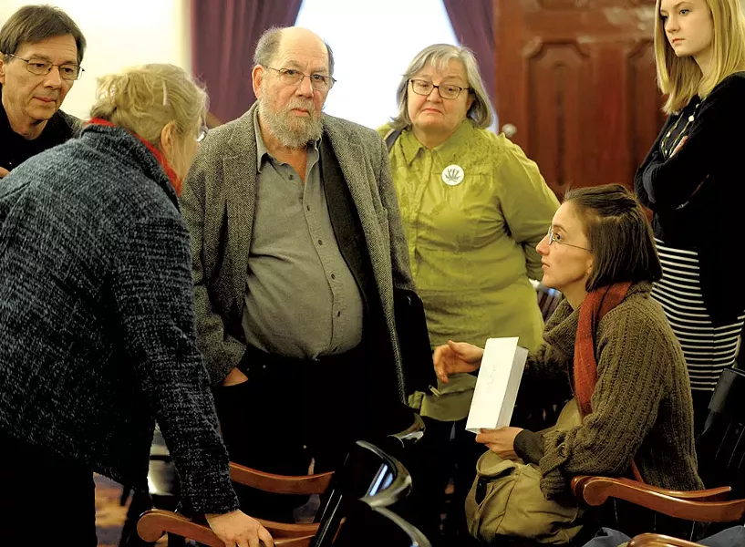 Sen. Jeanette White, left, speaking with Stuart Savel, center, and Emily Amanna, seated, from Vermont Home Grown - JEB WALLACE-BRODEUR