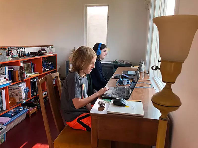Dash and Lionelle doing remote schooling - COURTESY OF ANGELA ARSENAULT