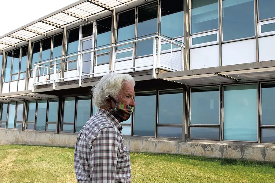 Project consultant John Caulo outside of Building 32 - COURTNEY LAMDIN ©️ SEVEN DAYS