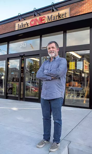 Erik Hoekstra, managing partner of Redstone in front of Jake's ONE Market in Burlington - JAMES BUCK