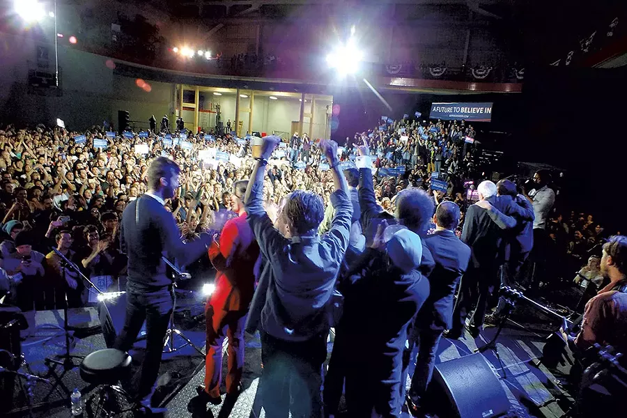 Sen. Bernie Sanders with members of Vampire Weekend, Foster the People and the Dirty Projectors Saturday in Iowa City - ADAM BURKE