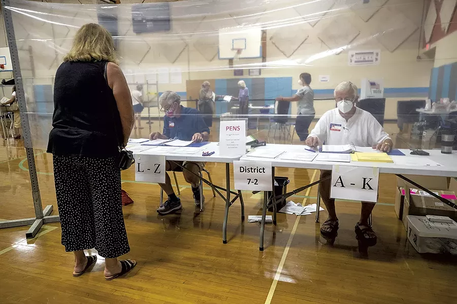 Voting in-person in South Burlington last summer - FILE: JAMES BUCK