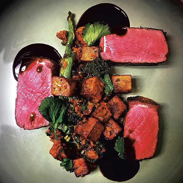 New York strip with potatoes and kimchi at ArtsRiot