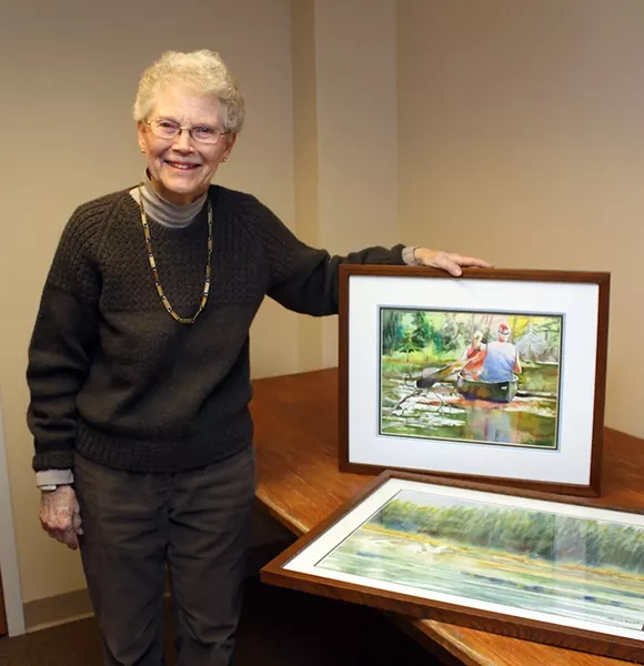 Elise Braun, with two of the 25 artworks donated to Gifford Medical Center - COURTESY OF GIFFORDMED.ORG